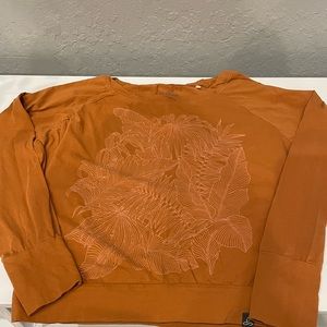Orange PrAna long sleeve with pink leaf print